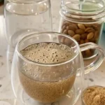 Bariatric seed trick recipe roasted pumpkin seeds with turmeric and ginger in glass jar on rustic wooden table